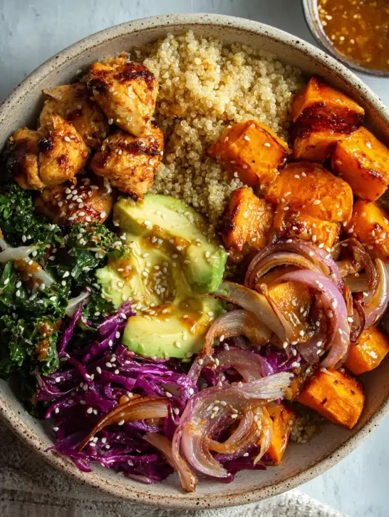 Spicy hot honey chicken power bowl served with lime and sesame